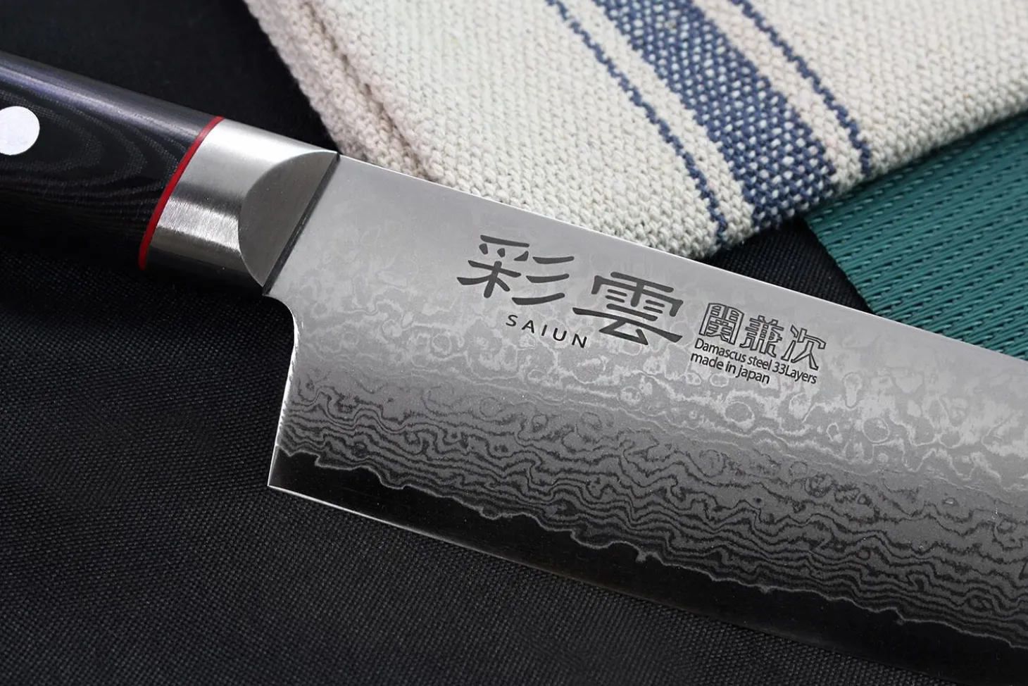 Couteau à découper japonais Kanetsugu Saiun 21cm damas 65 couches