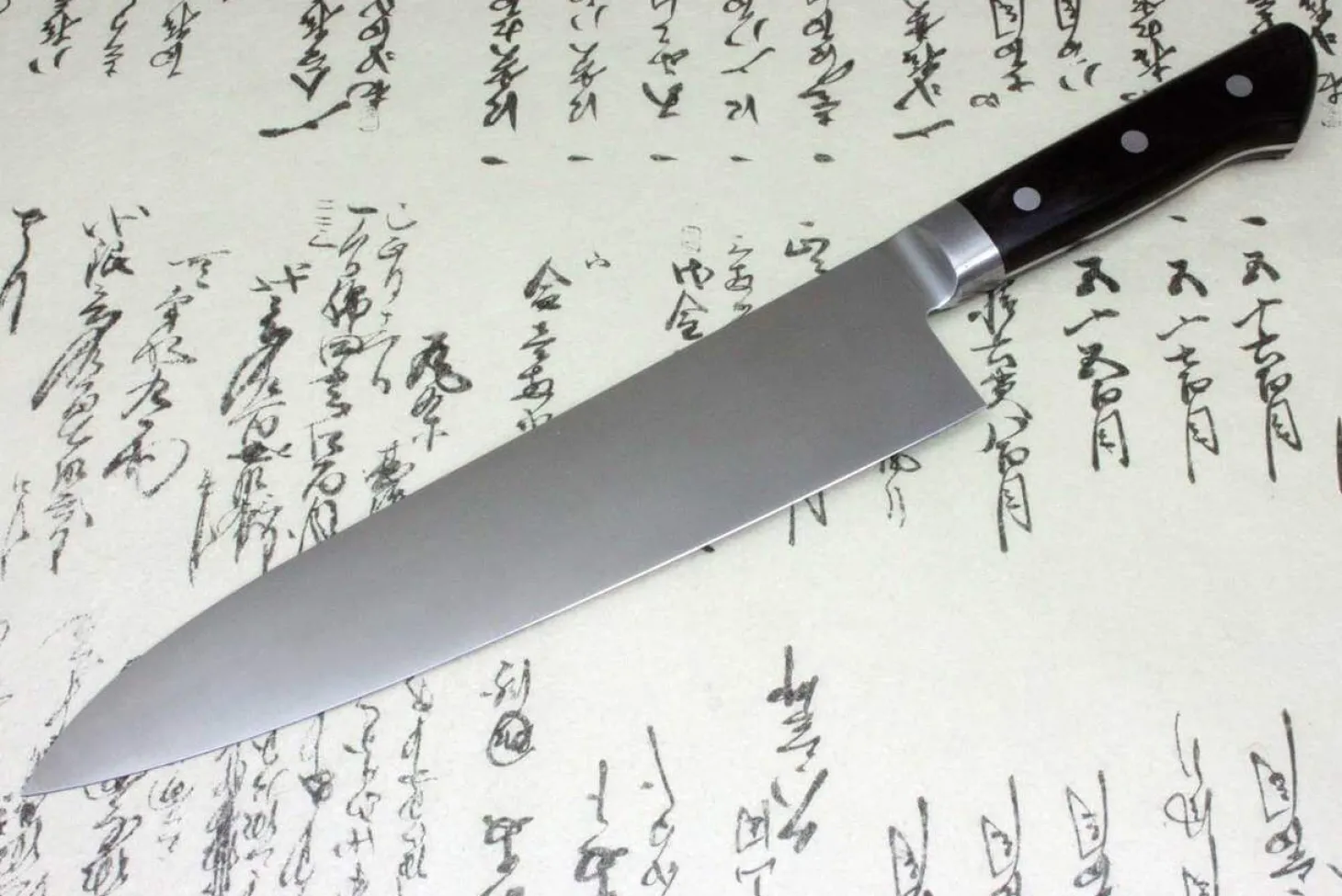 Couteau de chef 27cm Japan Kanetsune acier carbone 2N