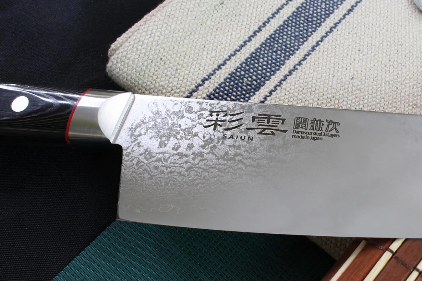 Couteau de chef japonais Kanetsugu Saiun 20cm damas 65 couches