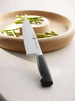 Couteau de chef Zwilling Four Star lame forgée 20 cm