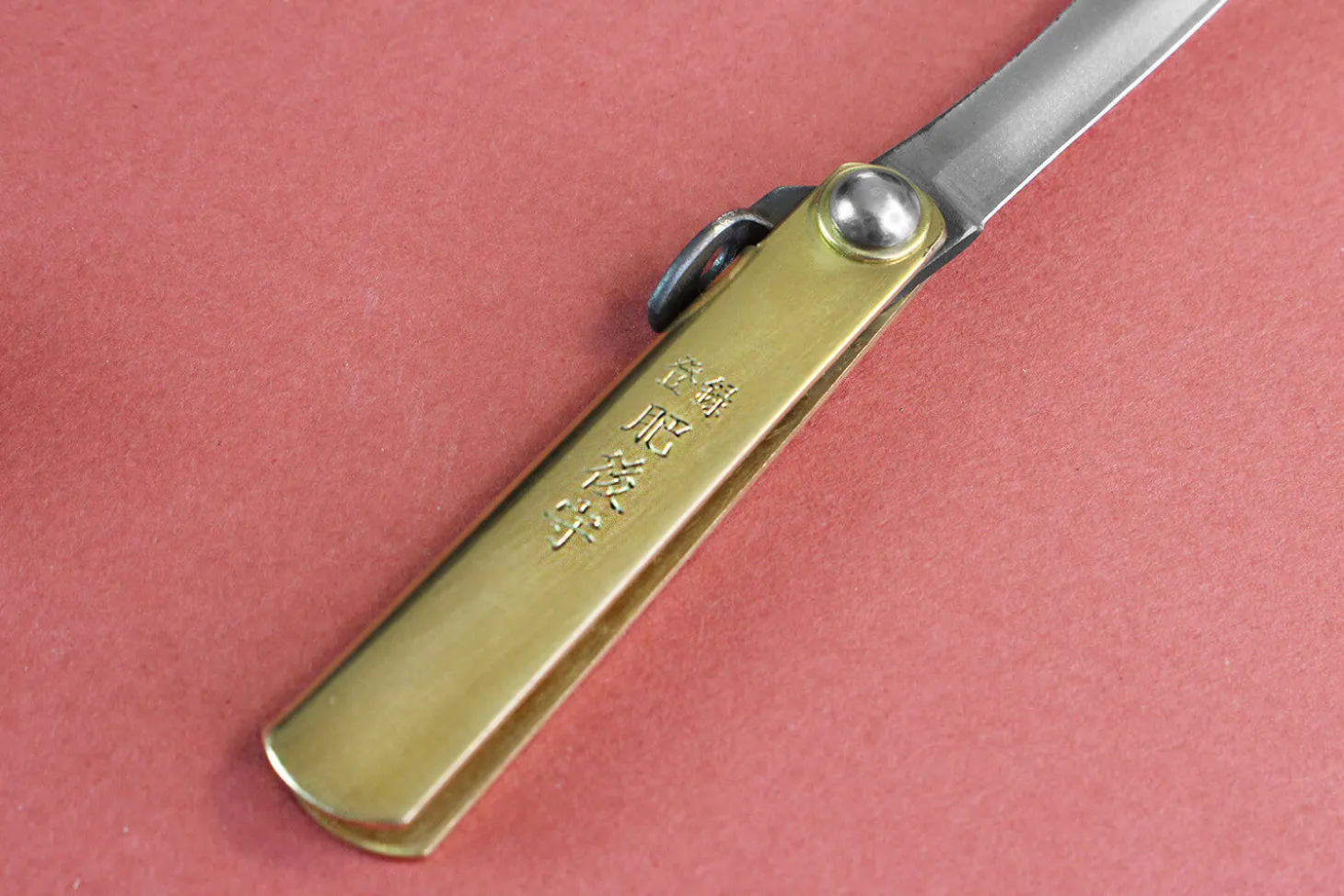 Couteau de poche Higonokami Kanetsune 4cm acier SK-5 manche laiton