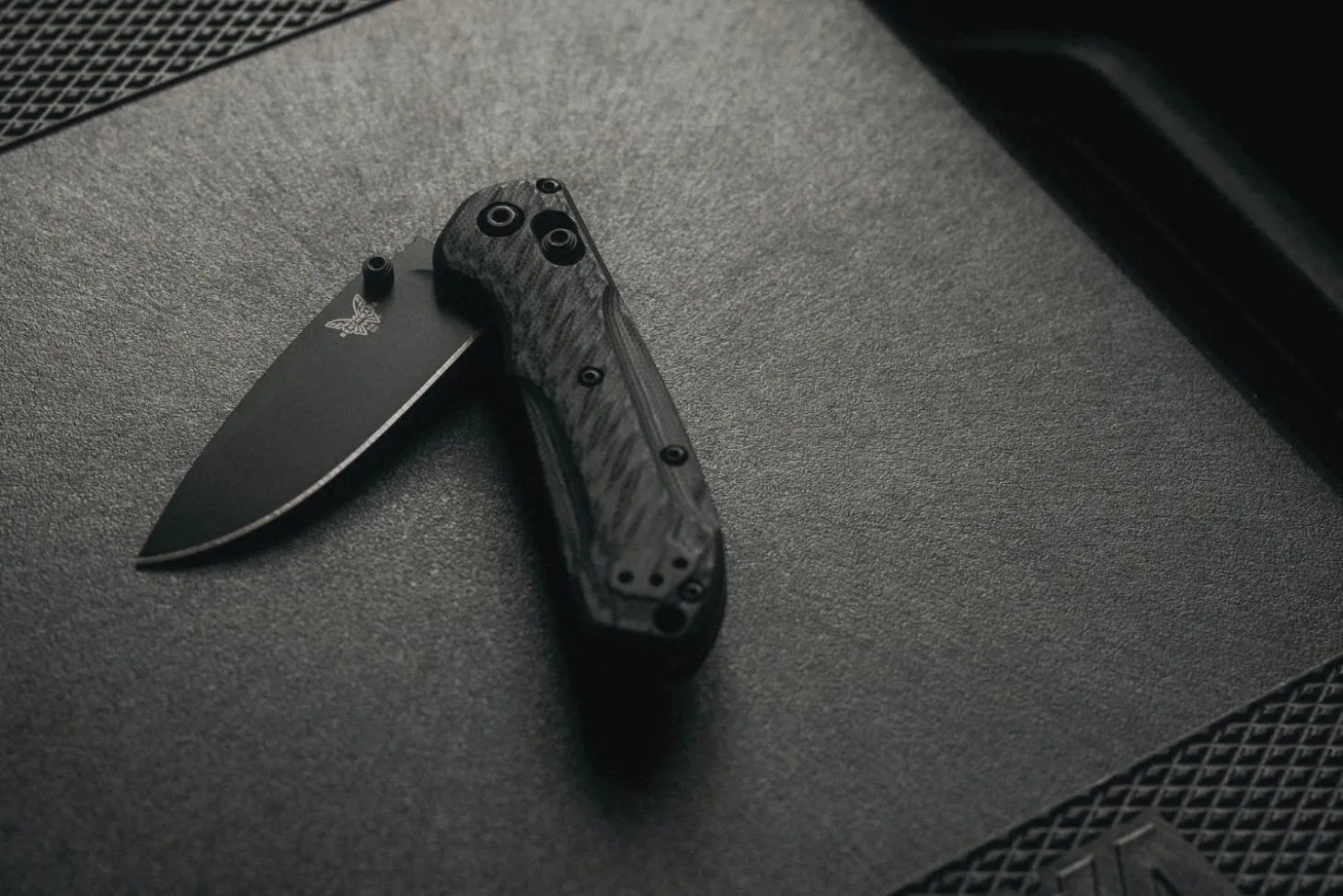 Couteau pliant Benchmade Mini Freek 565BK-02 lame noire manche G10 multicolore 10,3cm