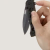 Couteau pliant CRKT M21 manche à trous G10 noir