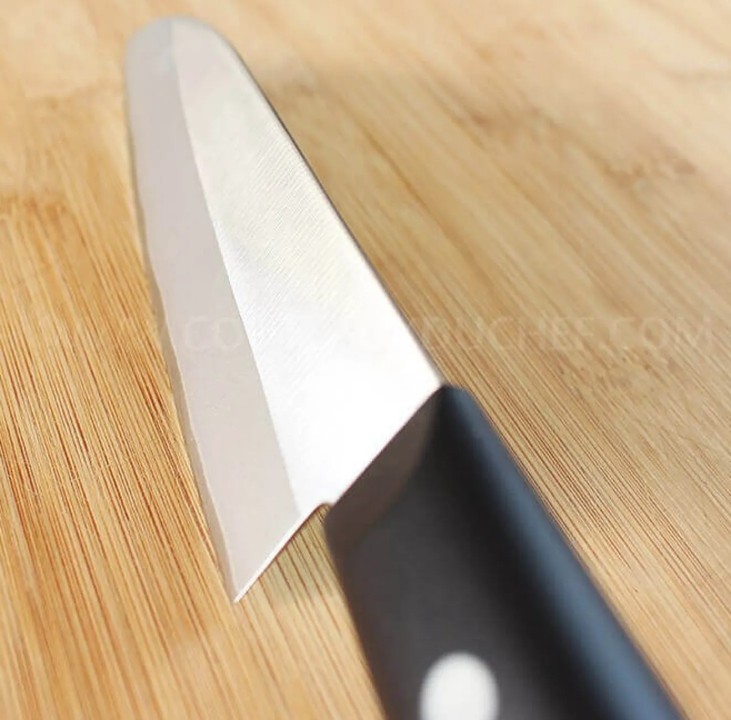 Couteau santoku japonais Tojiro DP Eco lame 14cm manche riveté