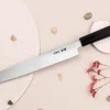 Couteau yanagiba japonais artisanal 27cm Sakai Takayuki Byakko manche en ébène + étui