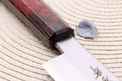 Couteau yanagiba japonais 27cm Sakai Takayuki Nanairo manche en résine laqué rouge