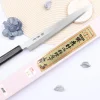 Couteau yanagiba japonais 24cm Sakai Takayuki Nanairo manche en résine ABS laquée
