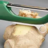 Eplucheur droit Joseph Joseph Multi-Peel en acier inox et polymère vert foncé