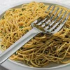 Fourchette spaghetti Alessi Tibidabo tout acier inox design par Kristiina Lassus