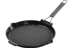 Gril rond Staub 28cm en fonte émaillée noir mat à poignée pliable