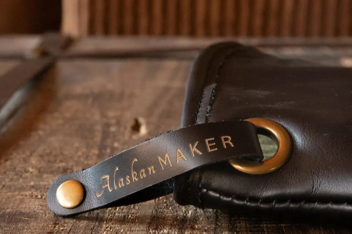 Manique Alaskan Maker Defender noir et orange en cuir
