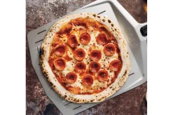 Pelle à pizza perforée Ooni 30cm en aluminium anodisé