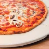 Pierre à pizza Cookut Crispiz en pierre réfractaire pour four et barbecue 38cm