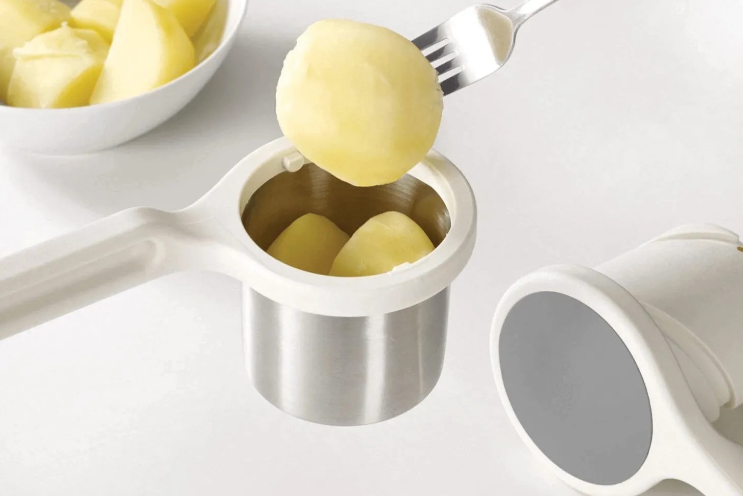 Presse-purée Joseph Joseph Helix en acier inoxydable et nylon