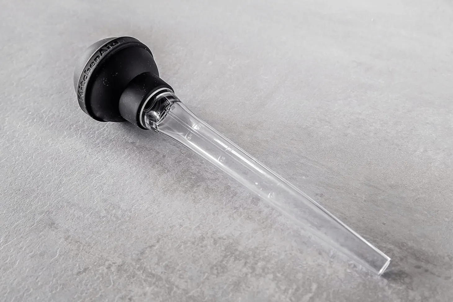 Seringue à badigeonner Kitchen Aid en silicone noir