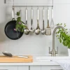 Spatule coudée ajourée Kitchen Aid tout en acier inoxydable