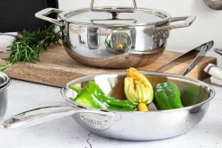 Wok Cristel Castel'Pro en acier inoxydable 18/10 3 ply